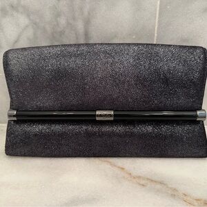 Elegant Black Clutch with Metal Accent